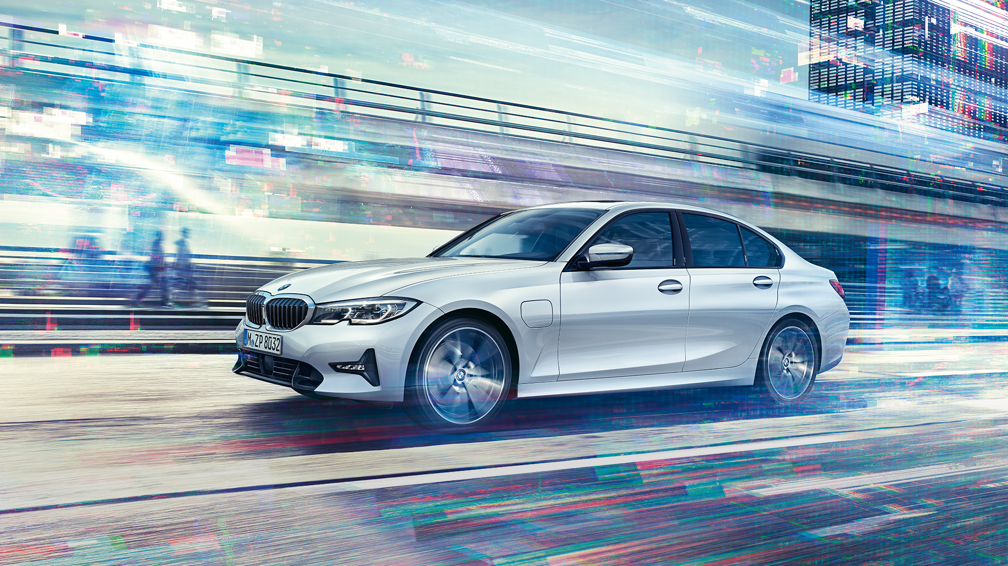 BMW serije 3 Limuzina, bočni pogled na BMW serije 3 Limuzina 330e u vožnji. Bočni pogled na BMW serije 3 Limuzina 330e u vožnji u urbanom okruženju.