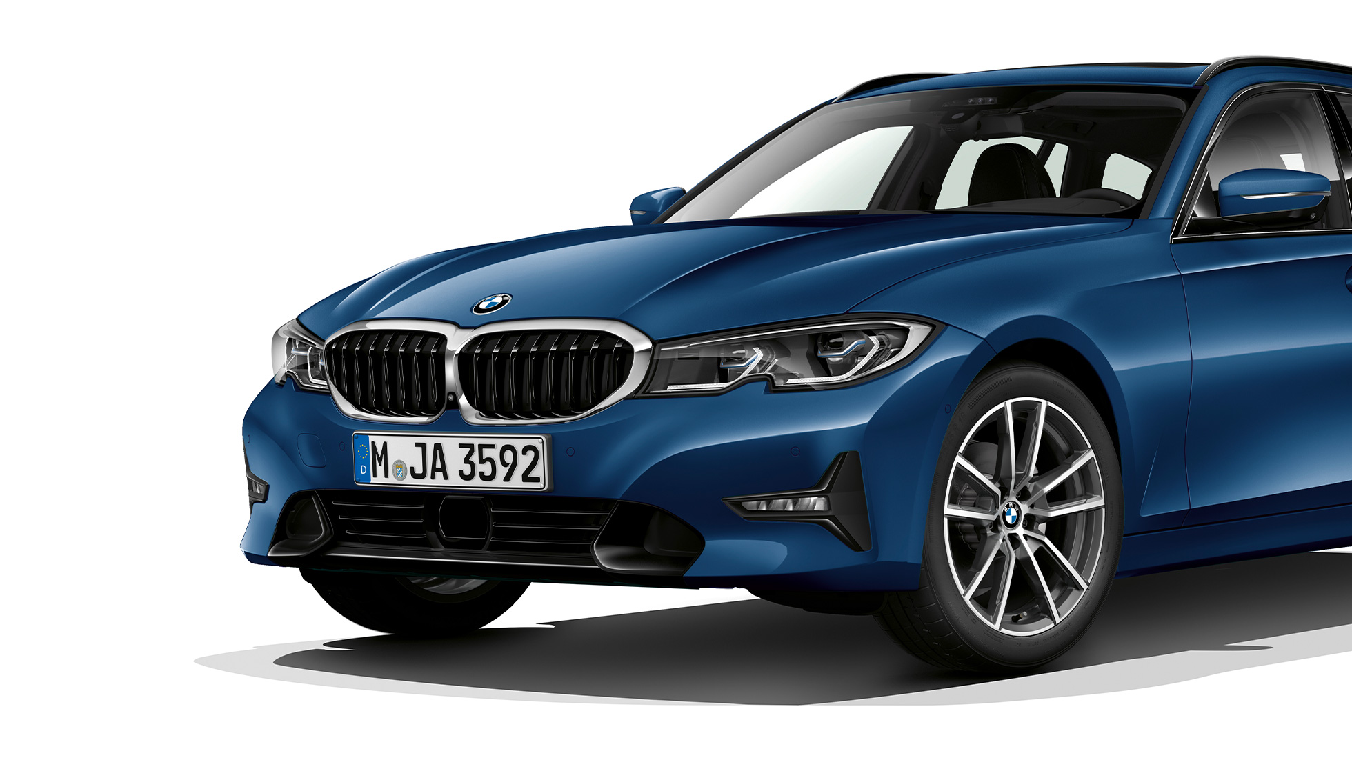 Tročetvrtinski prikaz prednjeg kraja modela Sport Line BMW serije 3 Touring, tročetvrtinski prikaz prednjeg kraja modela Sport Line