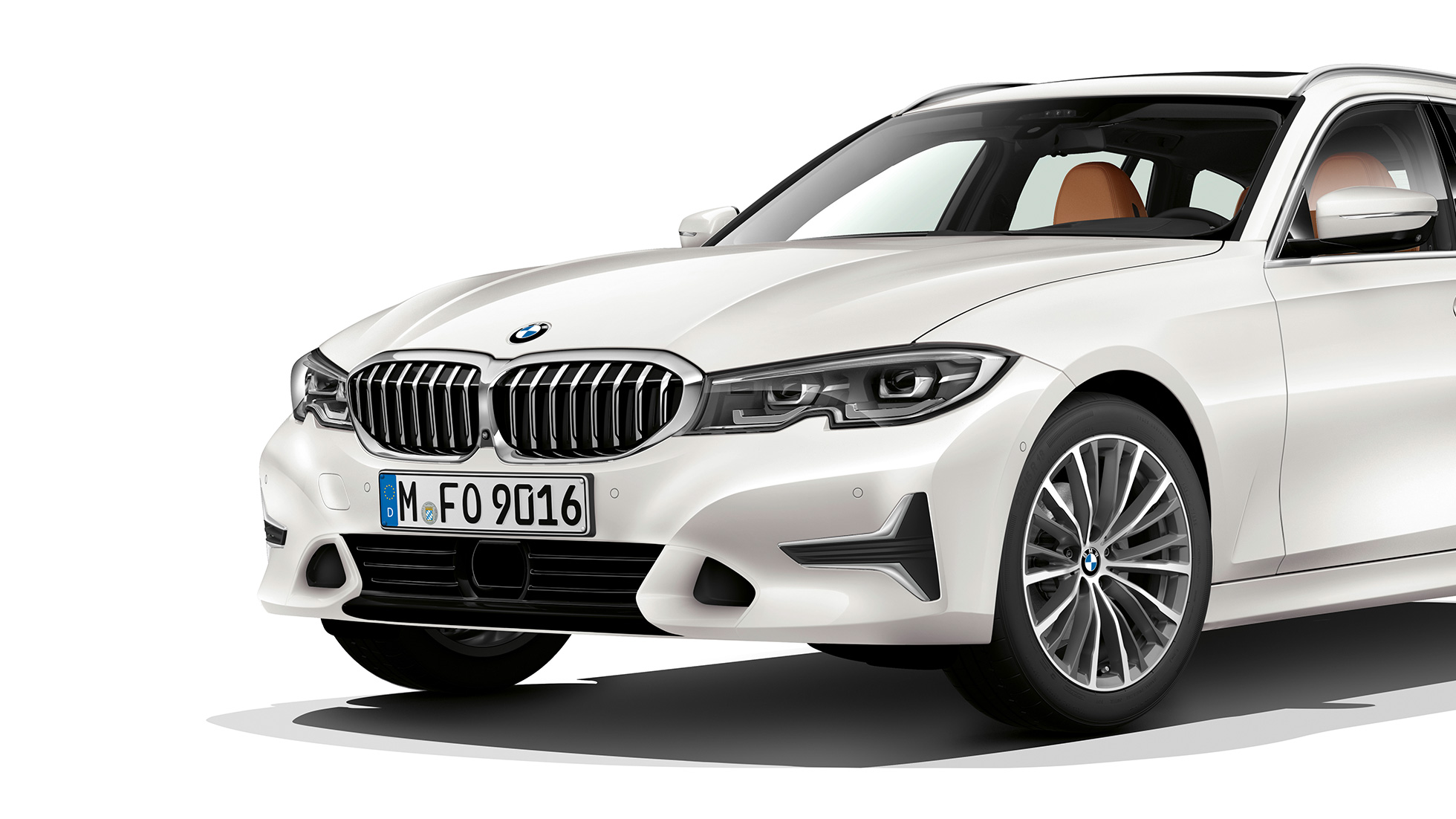 Tročetvrtinski prikaz prednjeg kraja modela Luxury Line BMW serije 3 Touring, tročetvrtinski prikaz prednjeg kraja modela Luxury Line