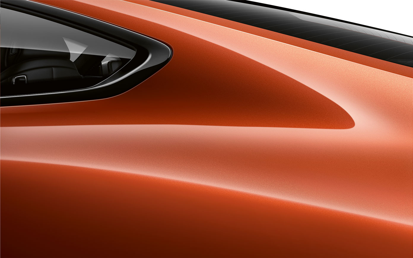 BMW serije 8 Coupé, detaljan prikaz C stupa. Detaljan prikaz C stupa BMW-a serije 8 Coupé u Sunset Orange metalik boji.