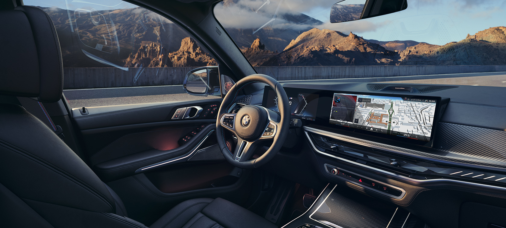 BMW X7 M60i xDrive G07 LCI kokpit unutrašnjost BMW X7 M60i xDrive G07 LCI kokpit unutrašnjost ispred planinskog krajolika