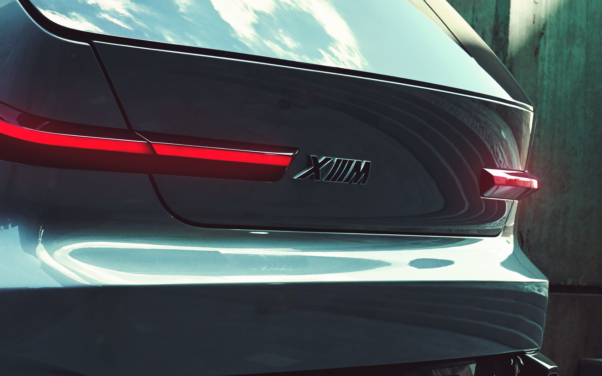 BMW Concept XM (G09) pogled straga u mirovanju pogled izbliza na XM logotip BMW Concept XM (G09) pogled straga u mirovanju pogled izbliza na XM logotip
